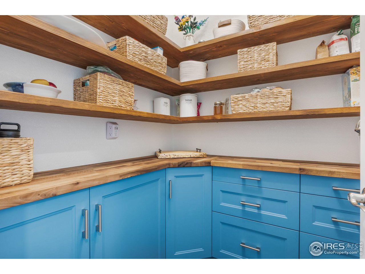 803 Old Wagon Trail Circle Lafayette, CO 80026 - Photo 5 of 30 a view of cabinet with a washer and dryer