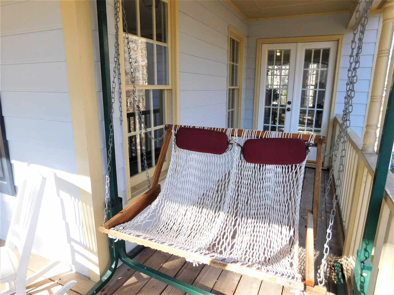 Step Outside and Enjoy A Good Book On The Rocking Chair Front Porch! Side Porch
