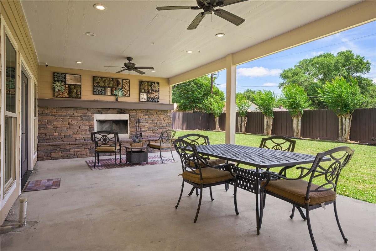 1502 Reimer Street Brenham, TX 77833 - Photo 25 of 30 a patio with table and chairs