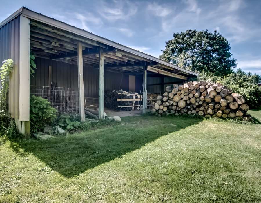 608 Hunter Road Caledonia, IL 61011 - Photo 23 of 25 a front view of a house with a garden