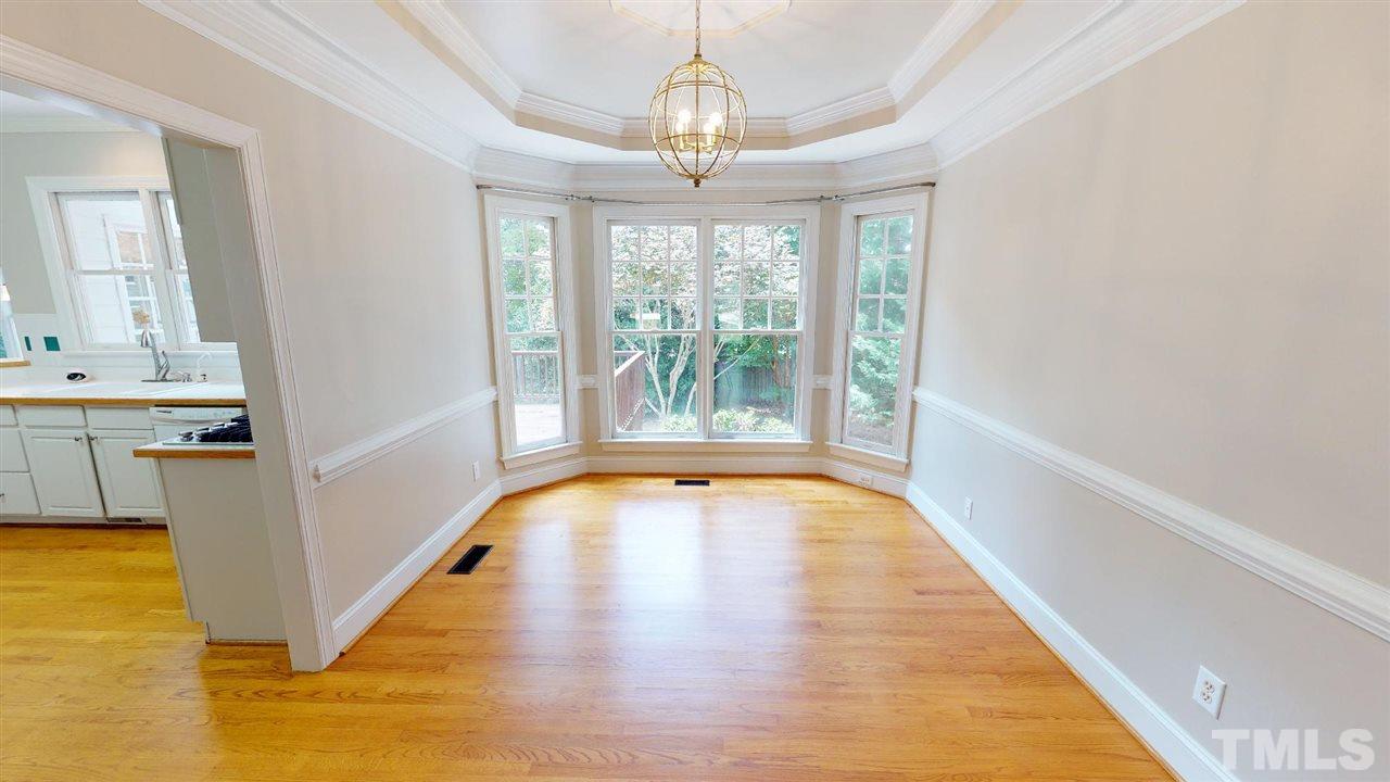 8212 Gaspari Court Raleigh, NC 27615 - Photo 6 of 18 a view of an empty room with window