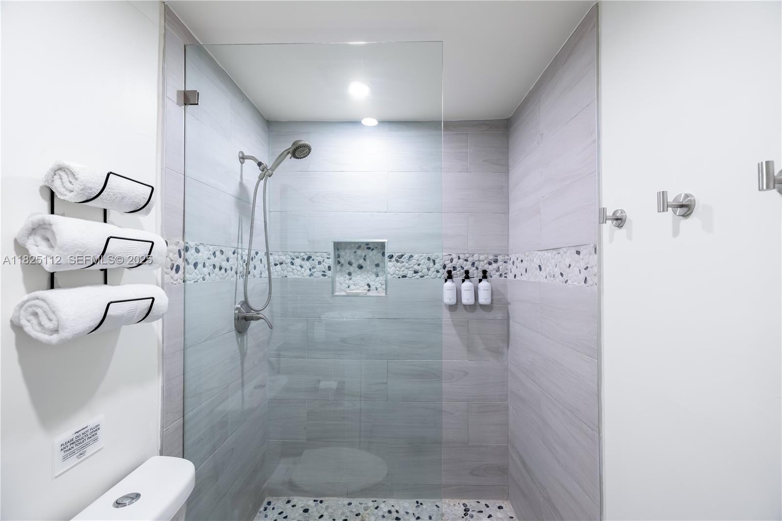 1836 Northwest 16th Terrace, Unit 3 Miami, FL 33125 - Photo 5 of 15 a bathroom with a shower