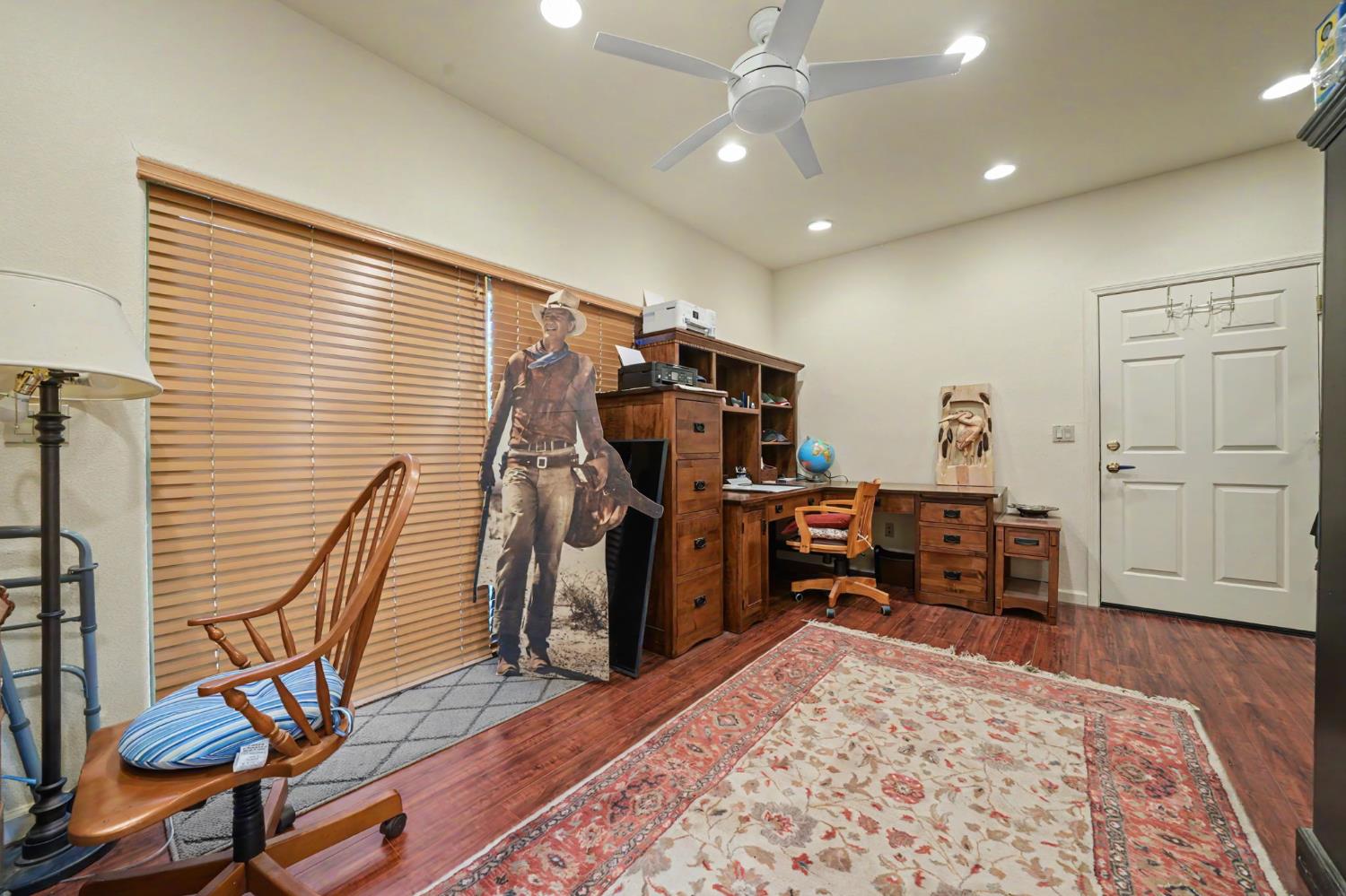 12091 Mierkey Road Jackson, CA 95642 - Photo 18 of 87 a view of a workspace with furniture and a window
