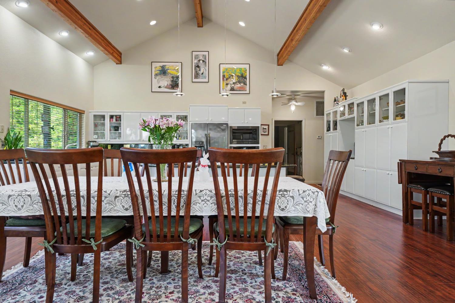 12091 Mierkey Road Jackson, CA 95642 - Photo 42 of 87 a view of a dining room with furniture window and wooden floor