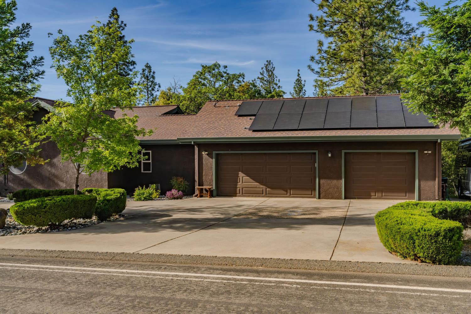 12091 Mierkey Road Jackson, CA 95642 - Photo 5 of 87 a house that has a tree in front of it