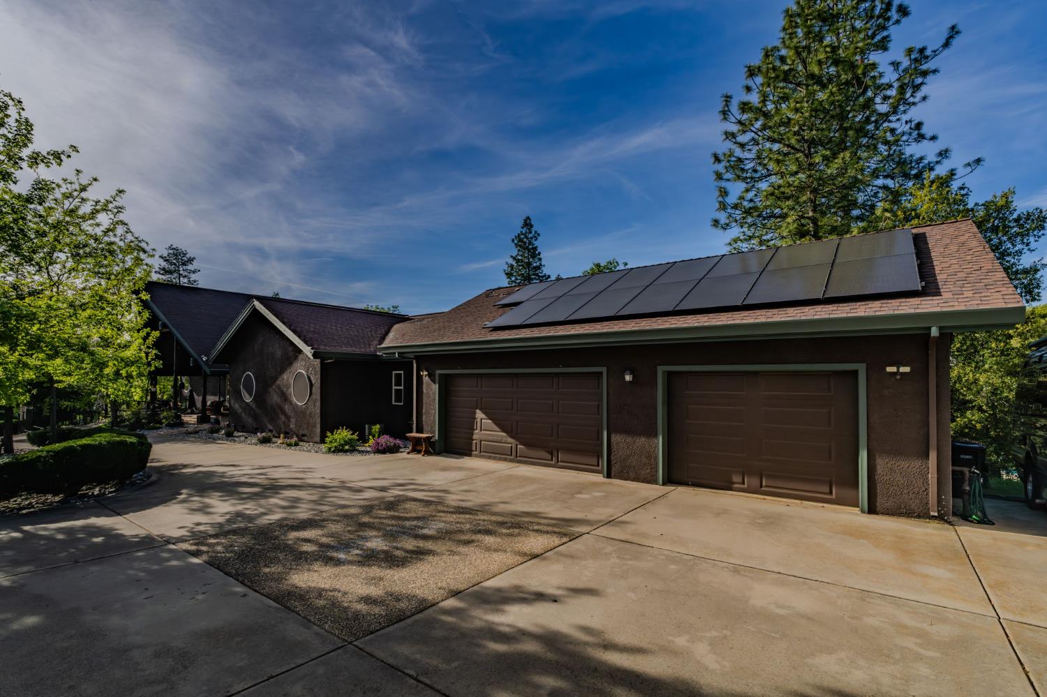 12091 Mierkey Road Jackson, CA 95642 - Photo 7 of 87 a front view of a house with a yard and garage