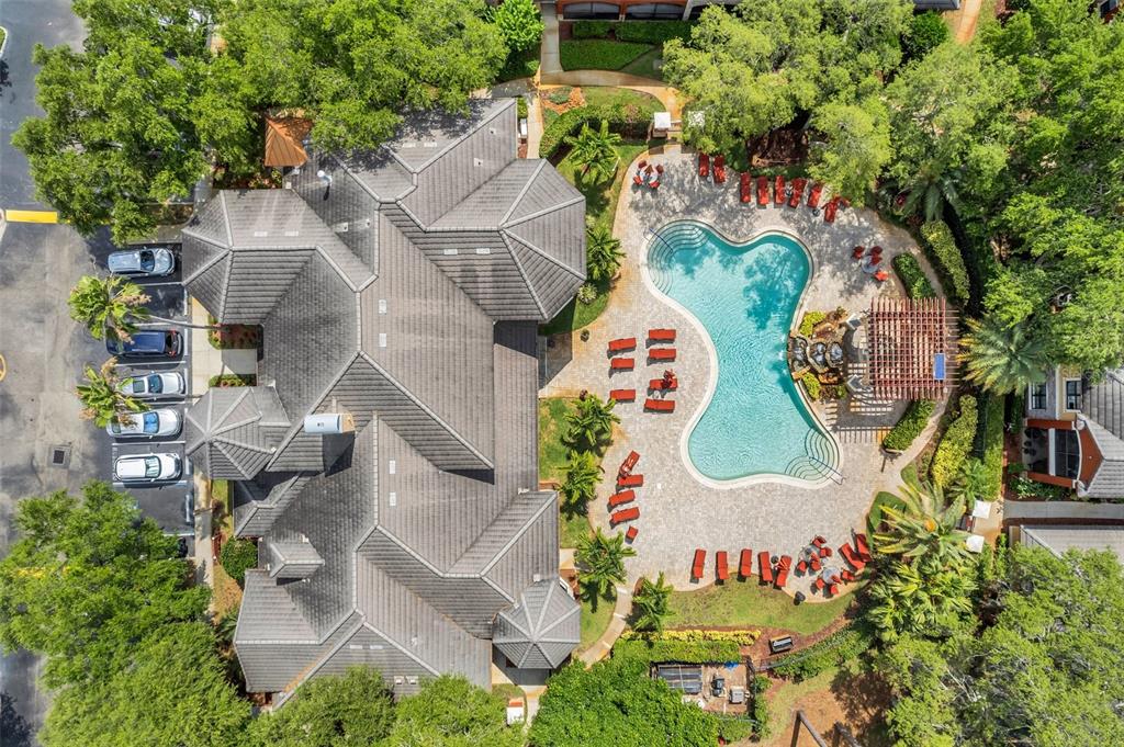 2245 Chianti Place, Unit 724 Palm Harbor, FL 34683 - Photo 38 of 76 an aerial view of a house with a swimming pool