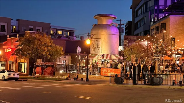 a view of a street with cars
