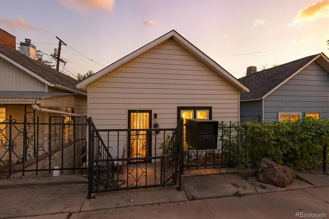 a front view of a house with glass windows