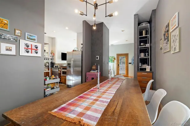 a bedroom with furniture and a wooden floor