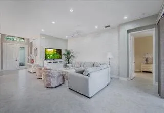 a kitchen with granite countertop a sink appliances and cabinets