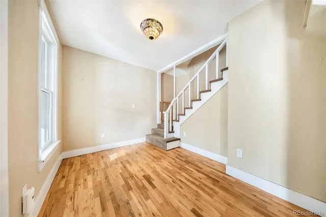 a view of entryway with wooden floor