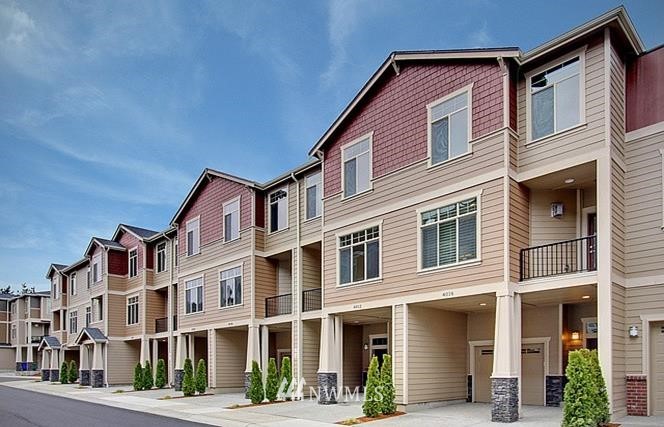 4004 Northeast 3rd Place Renton, WA 98056 - Photo 1 of 25 a front view of a building with street