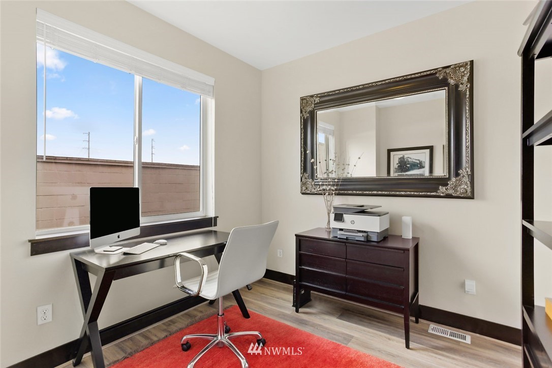 4004 Northeast 3rd Place Renton, WA 98056 - Photo 12 of 25 a view of a workspace with furniture
