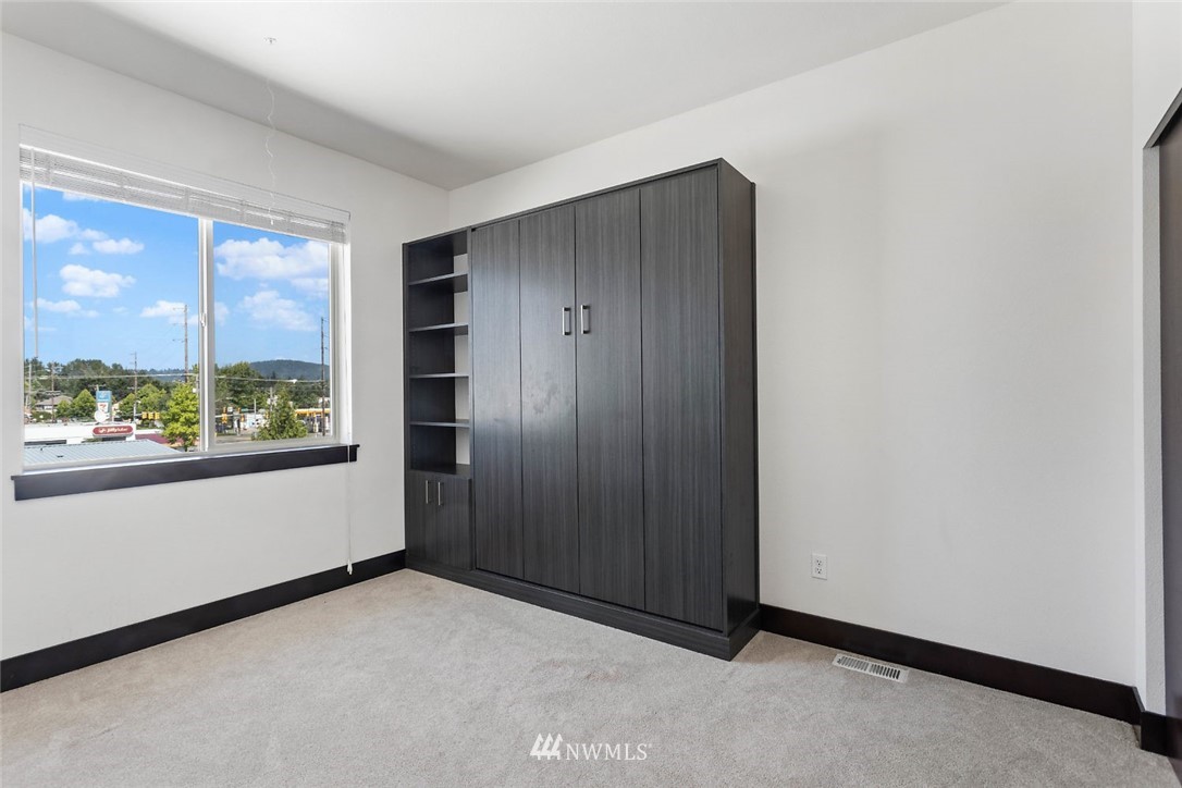4004 Northeast 3rd Place Renton, WA 98056 - Photo 13 of 25 a view of an empty room with a window
