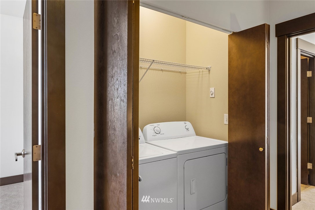 4004 Northeast 3rd Place Renton, WA 98056 - Photo 21 of 25 a utility room with dryer and washer