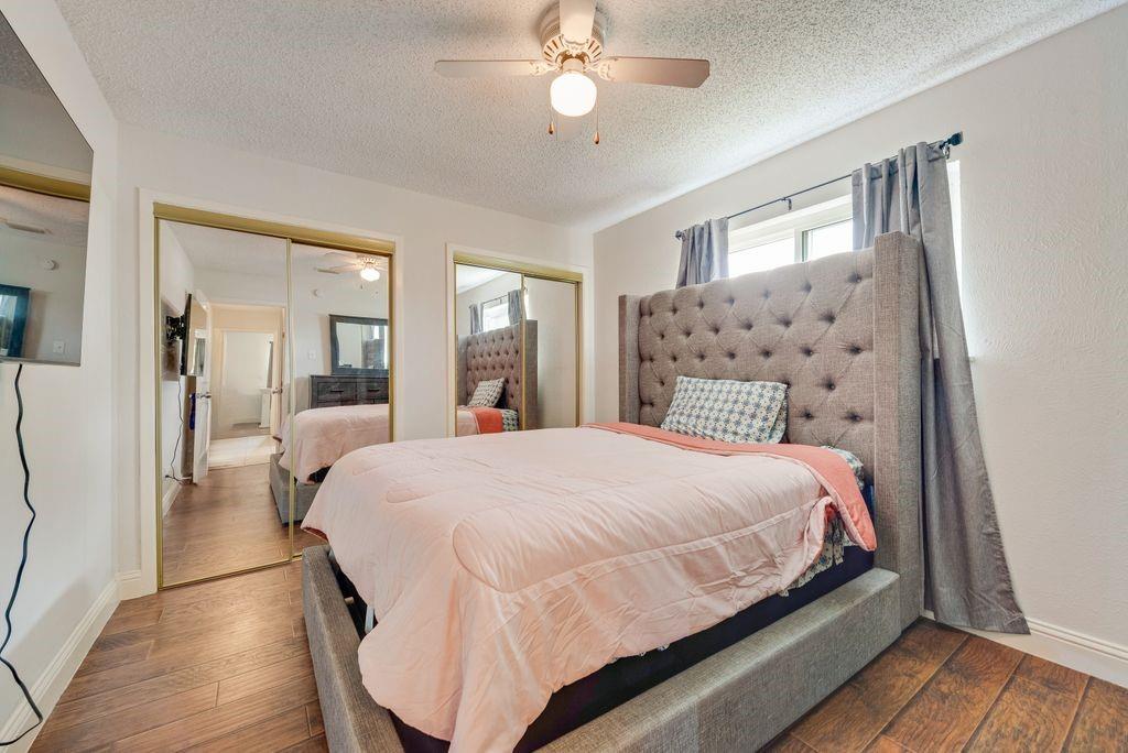 905 Pepperidge Court Lancaster, TX 75134 - Photo 14 of 19 a bedroom with a bed and window
