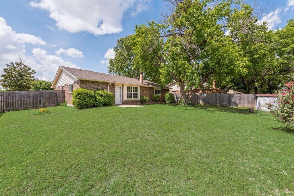 905 Pepperidge Court Lancaster, TX 75134 - Photo 17 of 19 a view of house with backyard