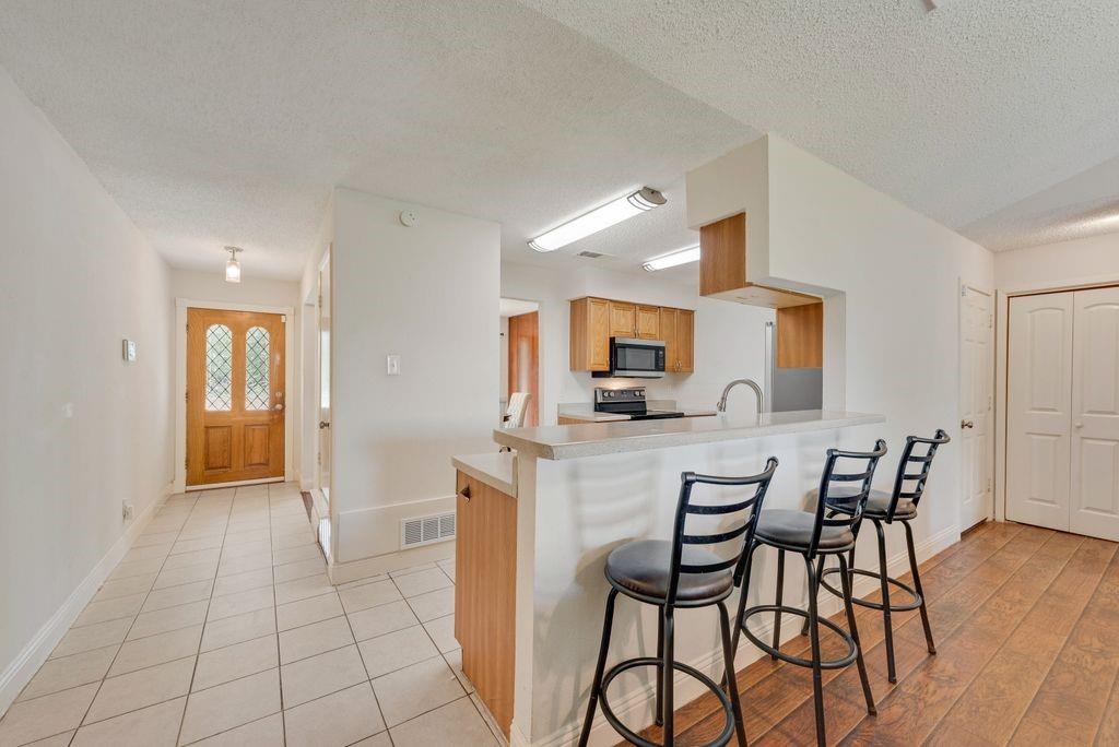 905 Pepperidge Court Lancaster, TX 75134 - Photo 7 of 19 a view of a dining room with furniture