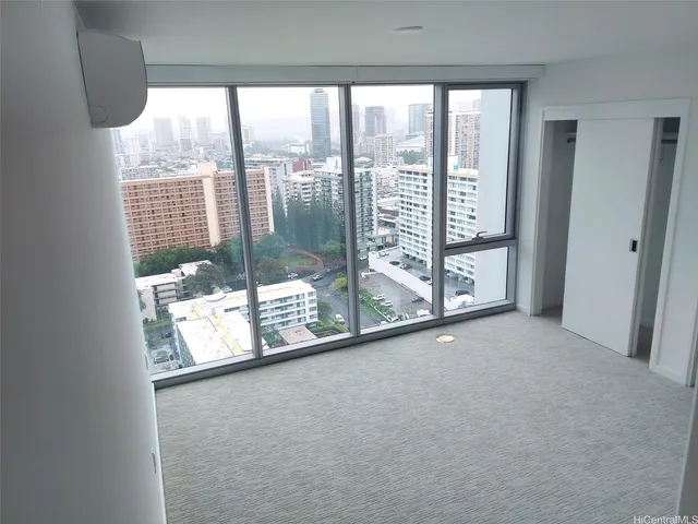 a bathroom with a double vanity sink and mirror with shower