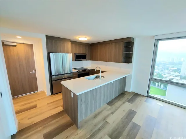 a open kitchen with a large window