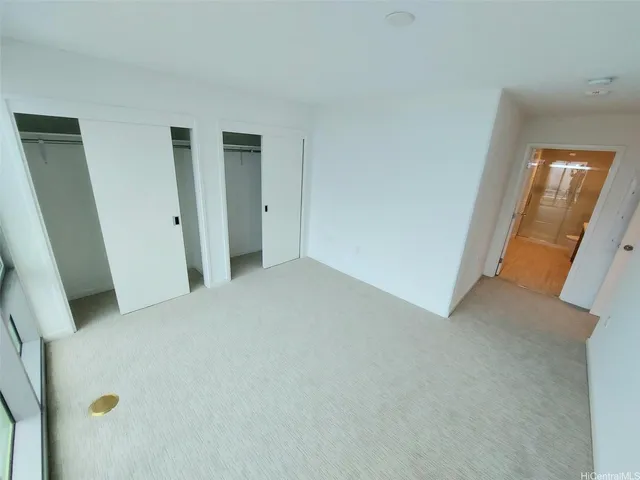 a view of a room with a large window