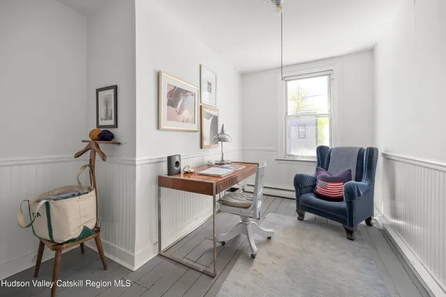 a bed room with a bed and a window