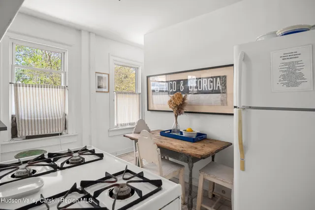 a table and chairs in a room