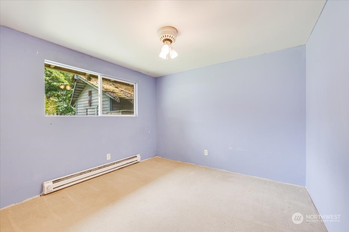 107 231st Street Southeast Bothell, WA 98021 - Photo 13 of 39 a view of an empty room with a window