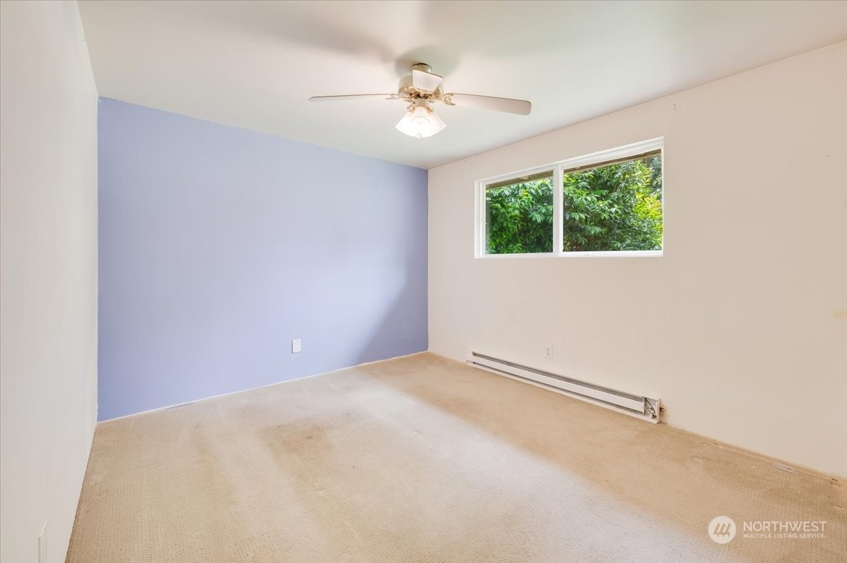 107 231st Street Southeast Bothell, WA 98021 - Photo 14 of 39 an empty room with a window