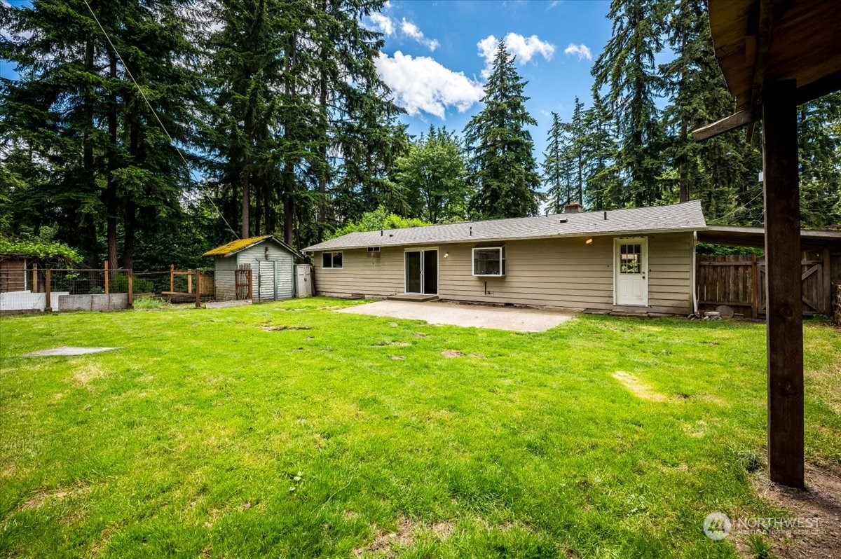 107 231st Street Southeast Bothell, WA 98021 - Photo 20 of 39 a front view of house with a garden