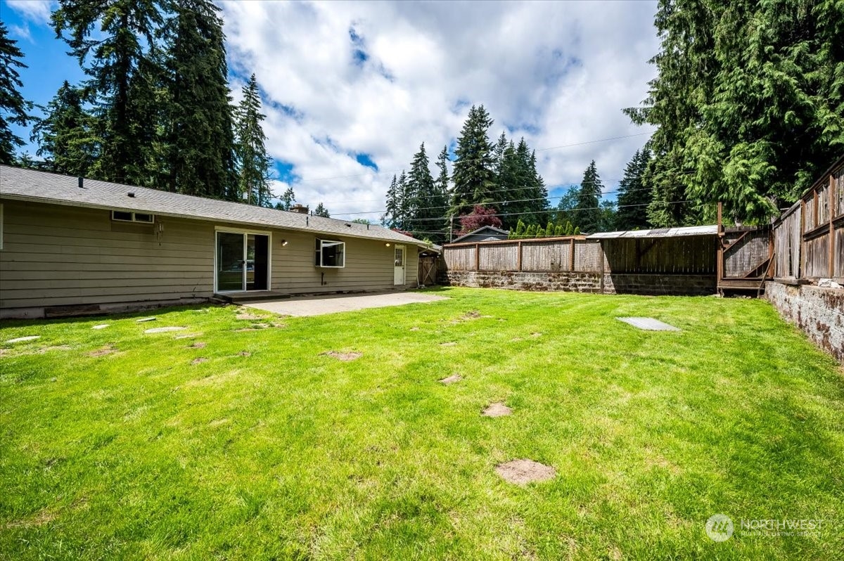 107 231st Street Southeast Bothell, WA 98021 - Photo 21 of 39 a view of a house with a yard