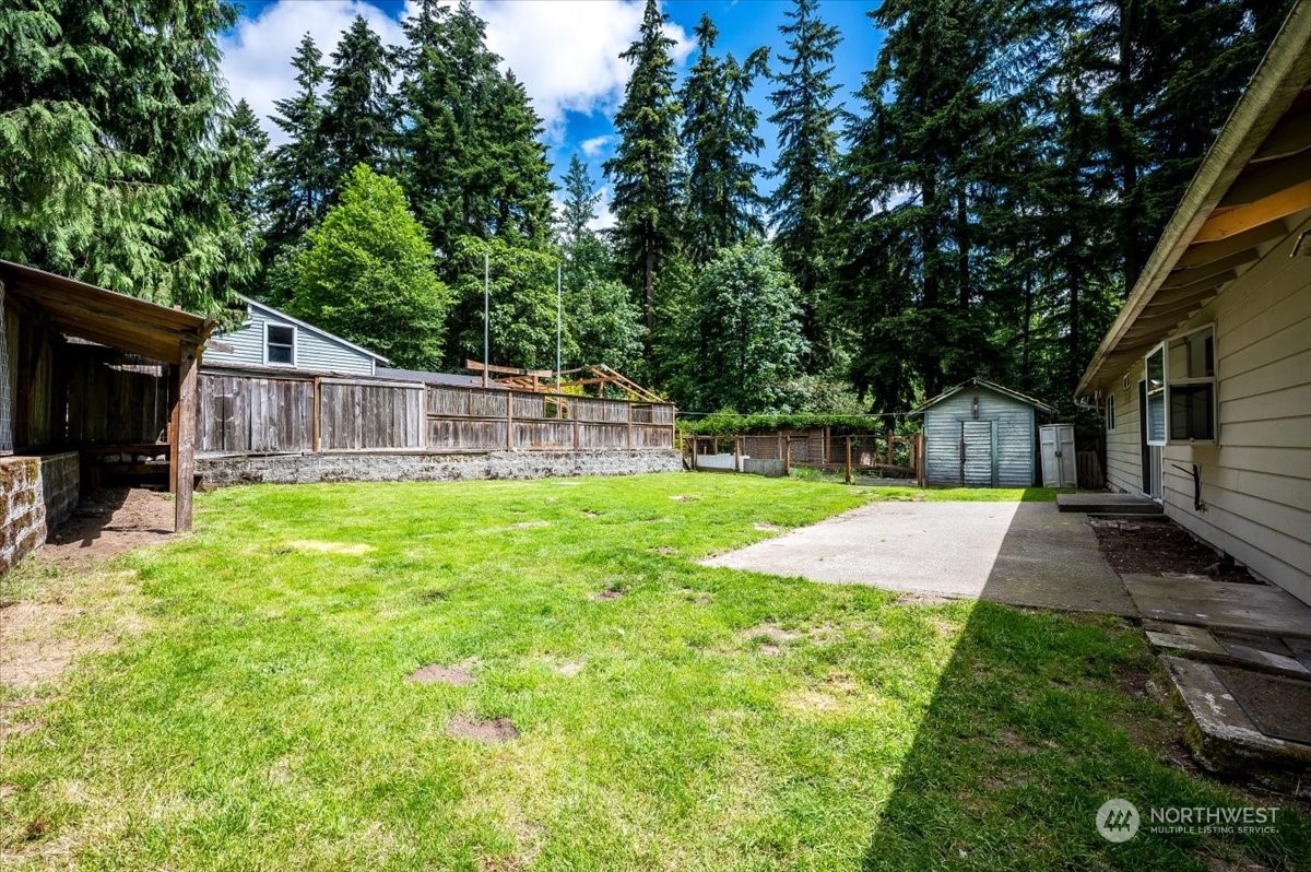 107 231st Street Southeast Bothell, WA 98021 - Photo 22 of 39 a view of a backyard with a small cabin