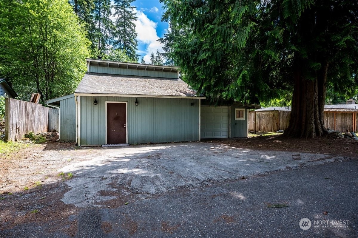 107 231st Street Southeast Bothell, WA 98021 - Photo 24 of 39 a house with trees in the background