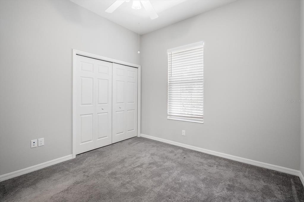 6523 Watson Road Riverview, FL 33578 - Photo 12 of 32 an empty room with windows