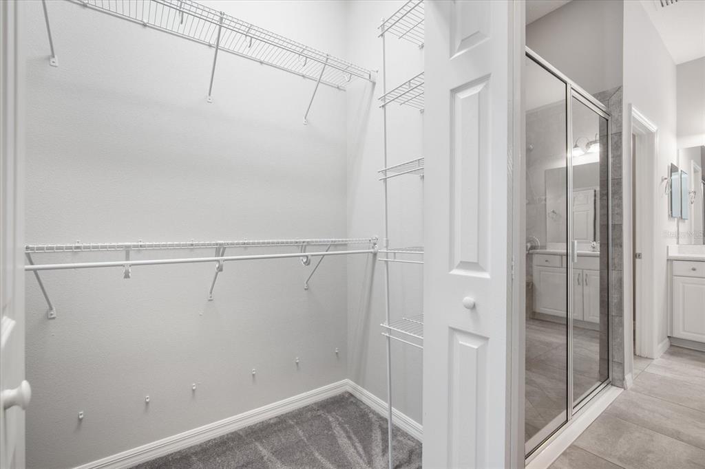 6523 Watson Road Riverview, FL 33578 - Photo 18 of 32 a view of a room with racks on the wall