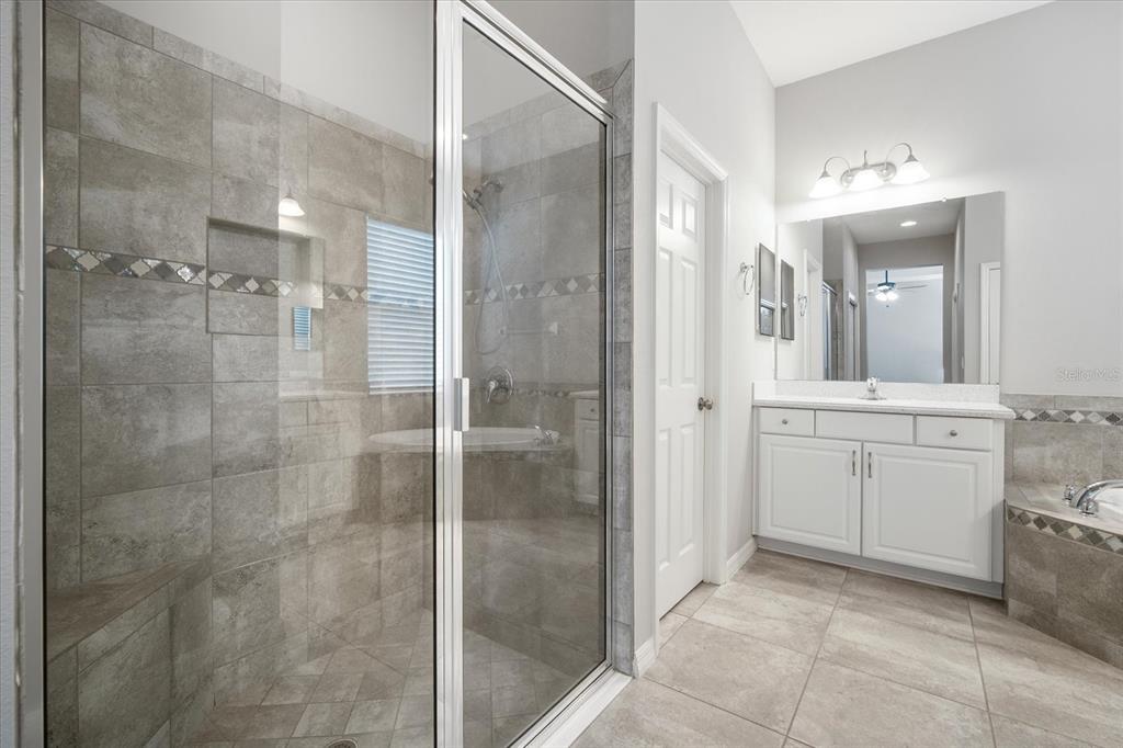 6523 Watson Road Riverview, FL 33578 - Photo 21 of 32 a bathroom with a shower and a sink