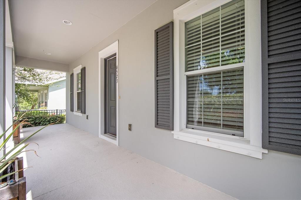 6523 Watson Road Riverview, FL 33578 - Photo 3 of 32 a view of an empty room with a fireplace and a window