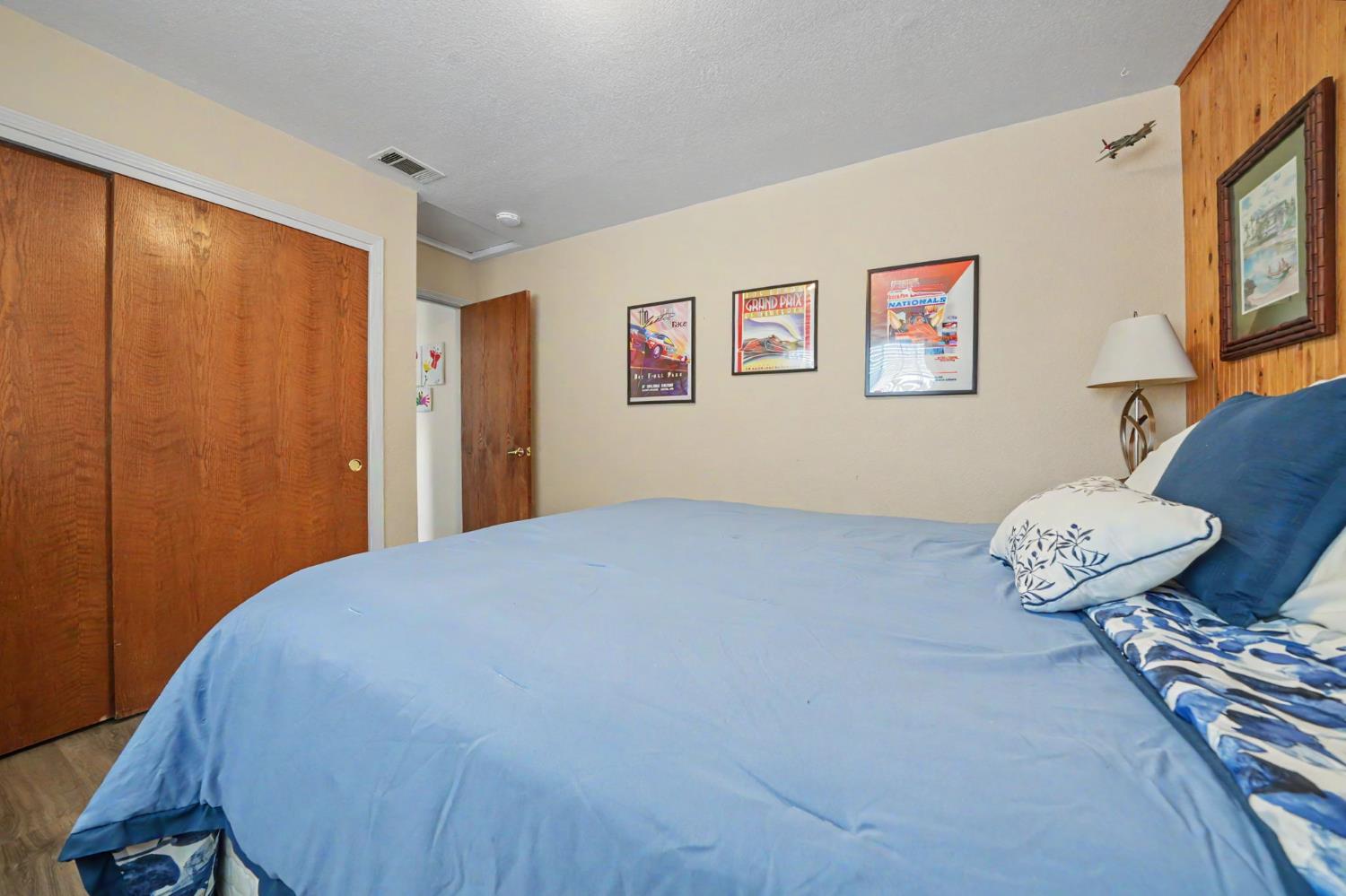 67 St Andrews Road Valley Springs, CA 95252 - Photo 34 of 58 a bedroom with a bed and a window