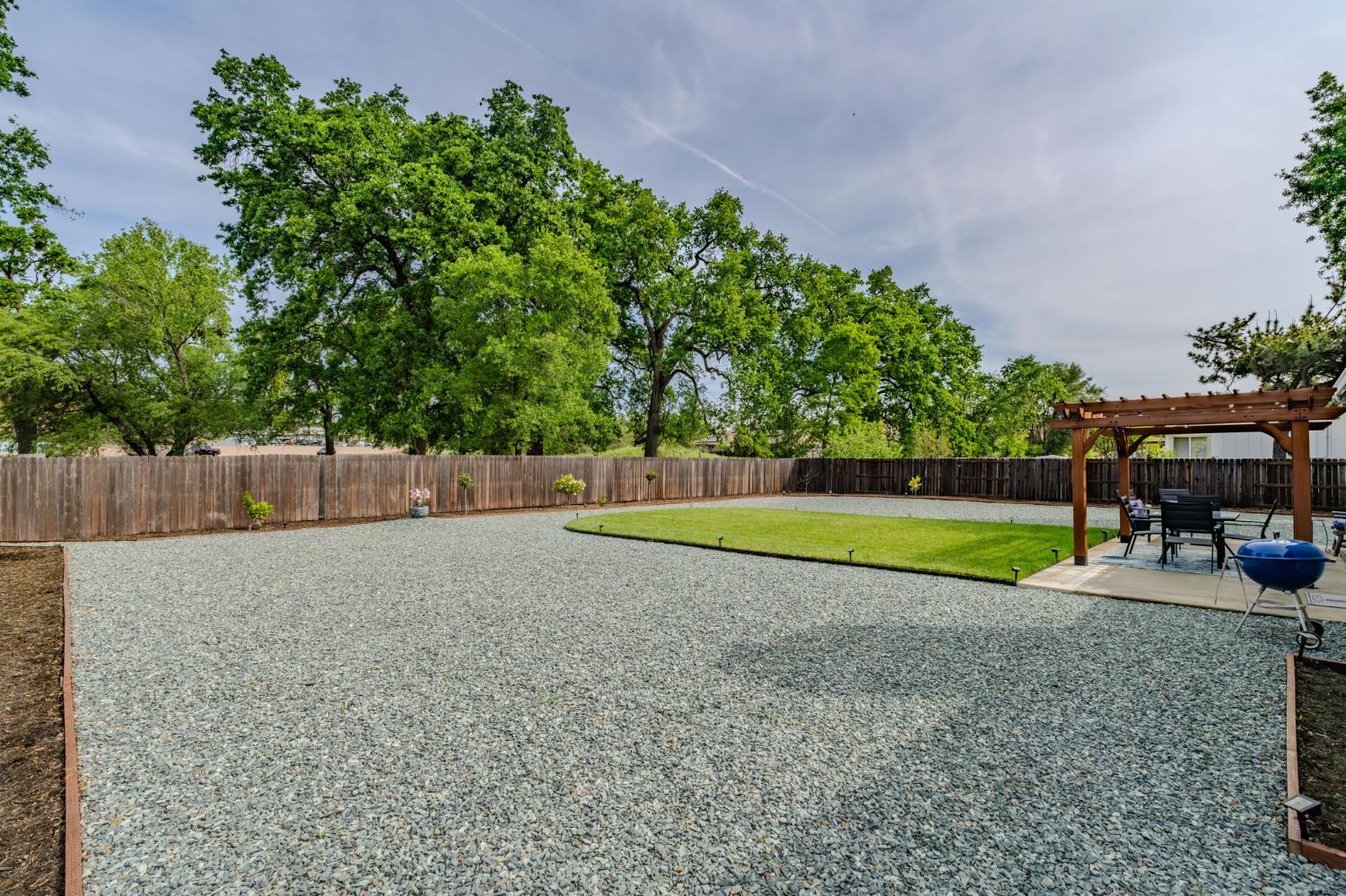 67 St Andrews Road Valley Springs, CA 95252 - Photo 47 of 58 a view of backyard with swimming pool and seating