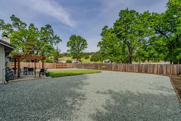a view of backyard with green space