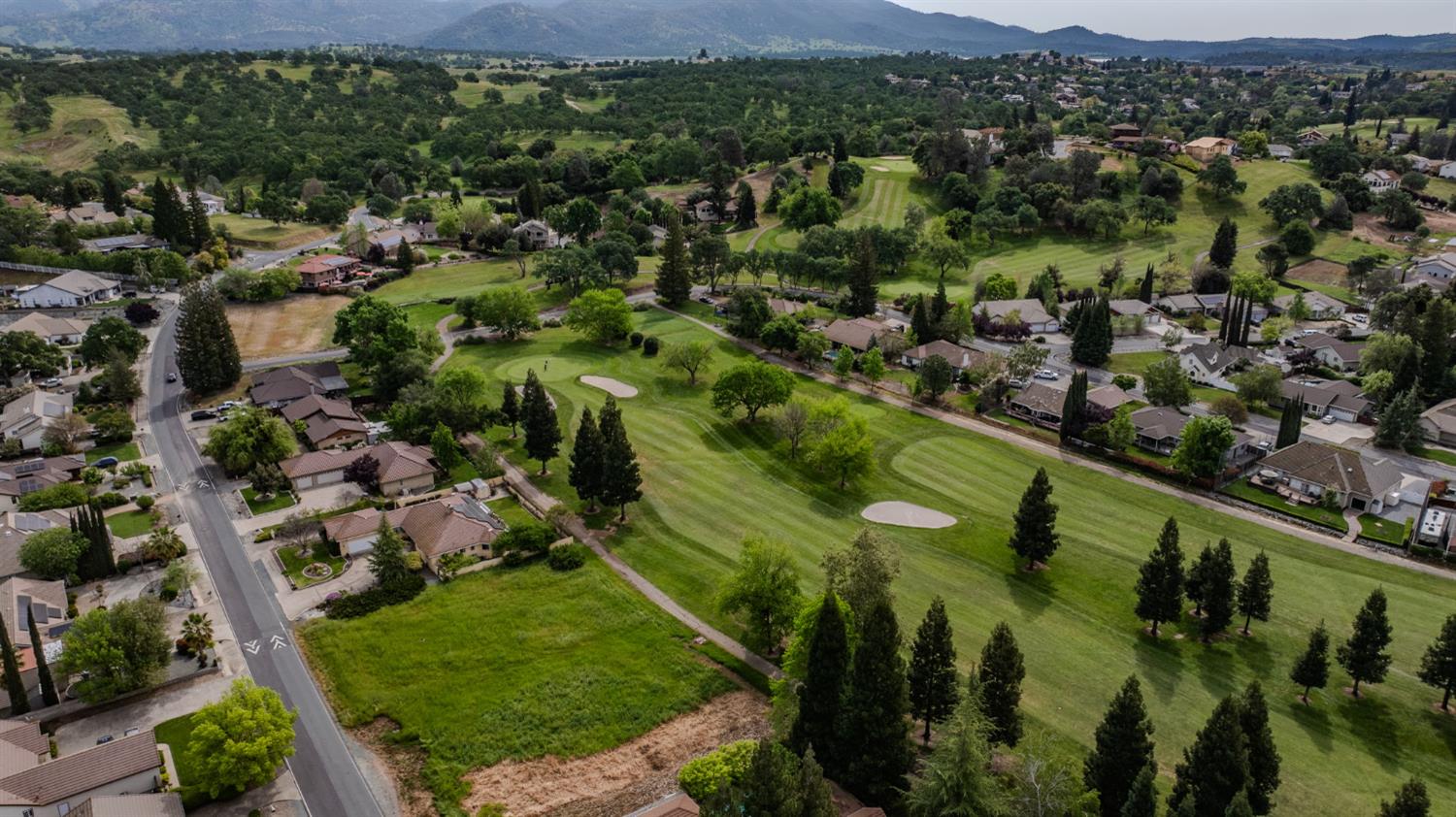 67 St Andrews Road Valley Springs, CA 95252 - Photo 55 of 58 a view of a city with lots of trees