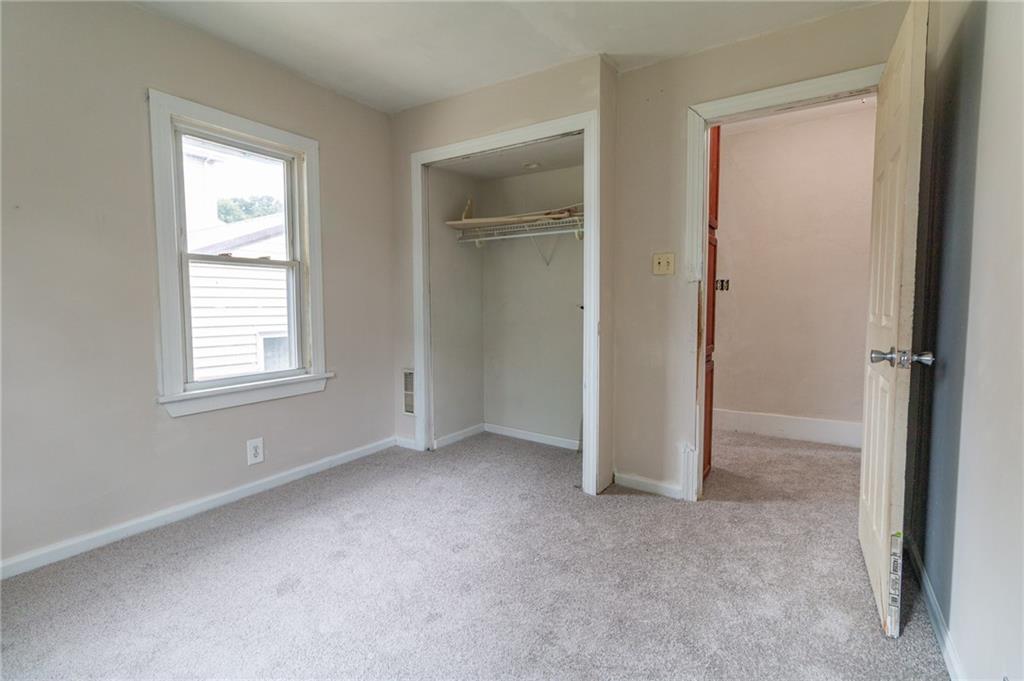 349 Orchard Street Springdale, PA 15144 - Photo 15 of 27 a view of an empty room with a window
