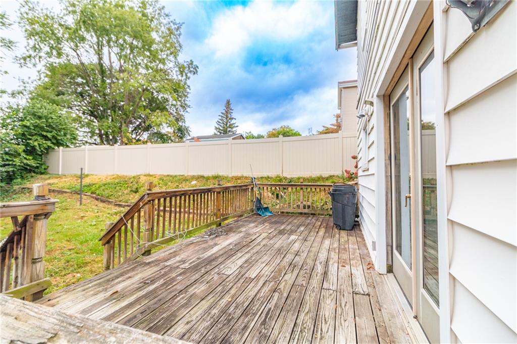 349 Orchard Street Springdale, PA 15144 - Photo 22 of 27 a view of balcony with wooden floor and fence