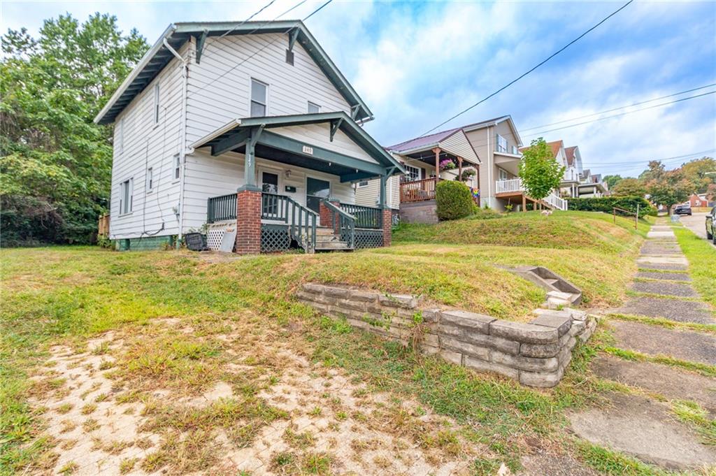 349 Orchard Street Springdale, PA 15144 - Photo 27 of 27 a view of a house with a yard