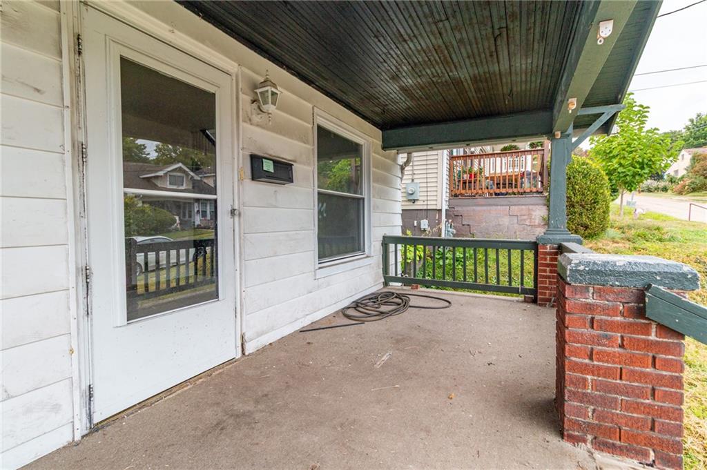 349 Orchard Street Springdale, PA 15144 - Photo 3 of 27 a view of a porch with seating space