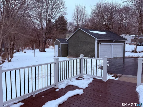 a view of a wooden roof deck