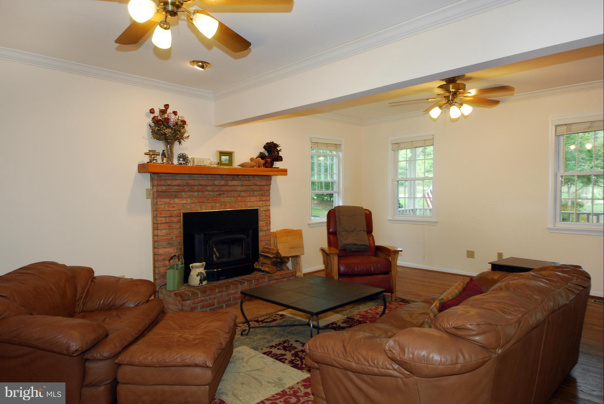 1307 Mayo Road Edgewater, MD 21037 - Photo 6 of 20 Living Room with fireplace