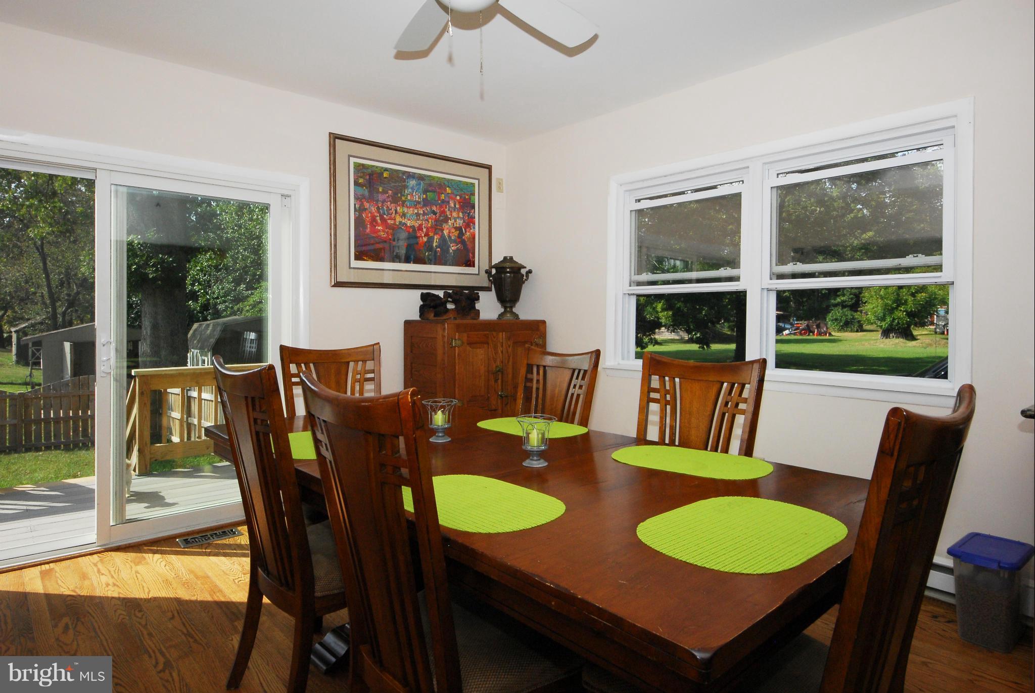 1307 Mayo Road Edgewater, MD 21037 - Photo 10 of 20 Dining area has sliding doors to deck