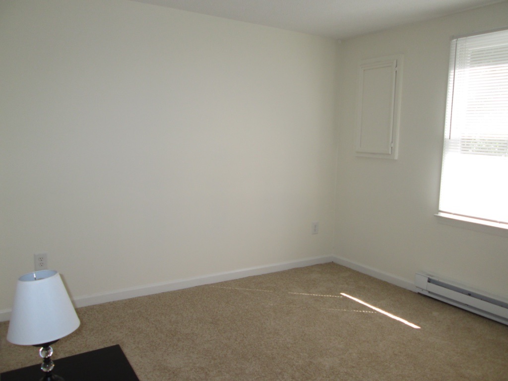 118 Village Road Shipman, VA 22971 - Photo 13 of 16 an empty room with a window